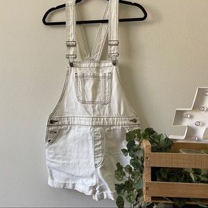 White overalls with stitch accents